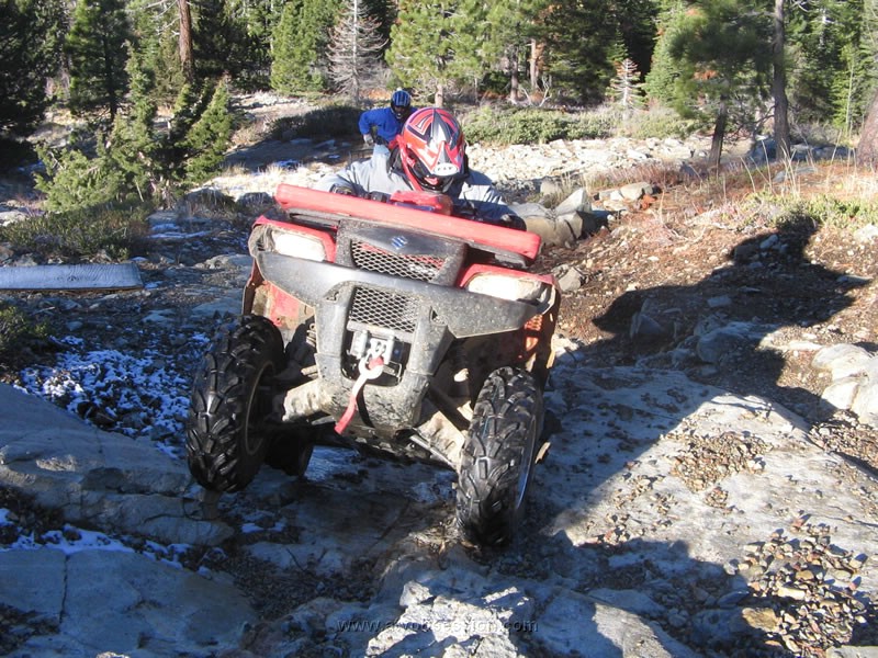 018. Goin' nowhere.  Look at Dusty's rear tire..it's on a sheet of ice..jpg