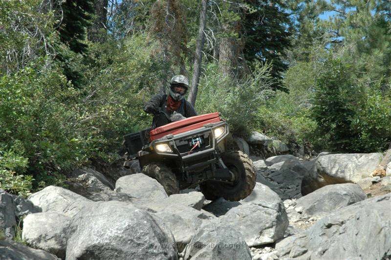 12. Ken 700 rounds the corner and finds the terrain a little tougher..jpg