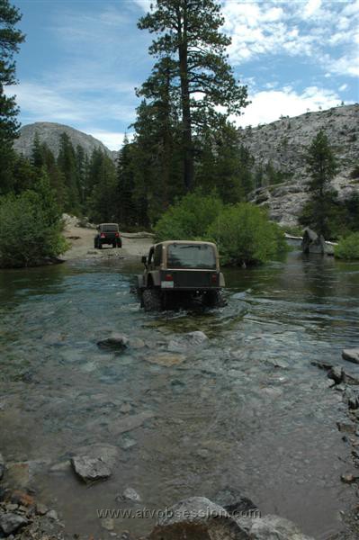 20. Along come Ken and Barbie in their matching Jeeps..jpg