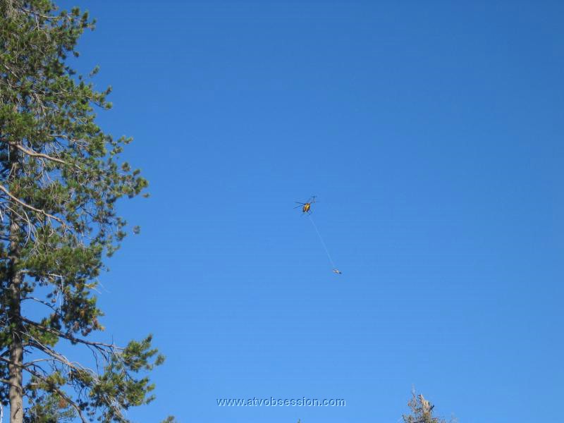 17. Pack up day for the caretakers, Lee and Merlin.  Away goes a motorcycle..jpg