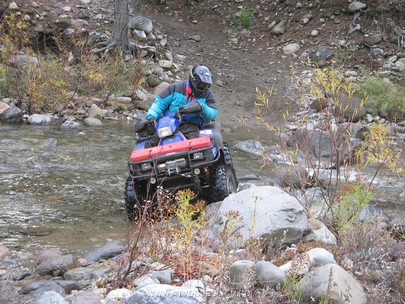 12. Couldn't resist checking out his trail tires on the rocks..jpg