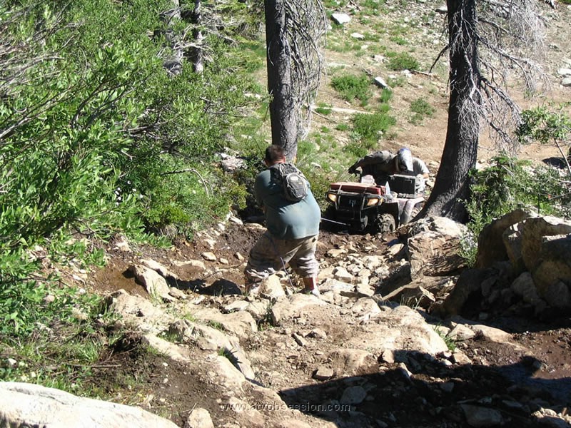 079. Ken starts to work his way up, with Chris on first rope duty..jpg