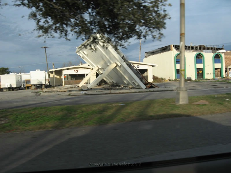 36. Miles away from the levee...still damage...notice the FEMA trailers..jpg