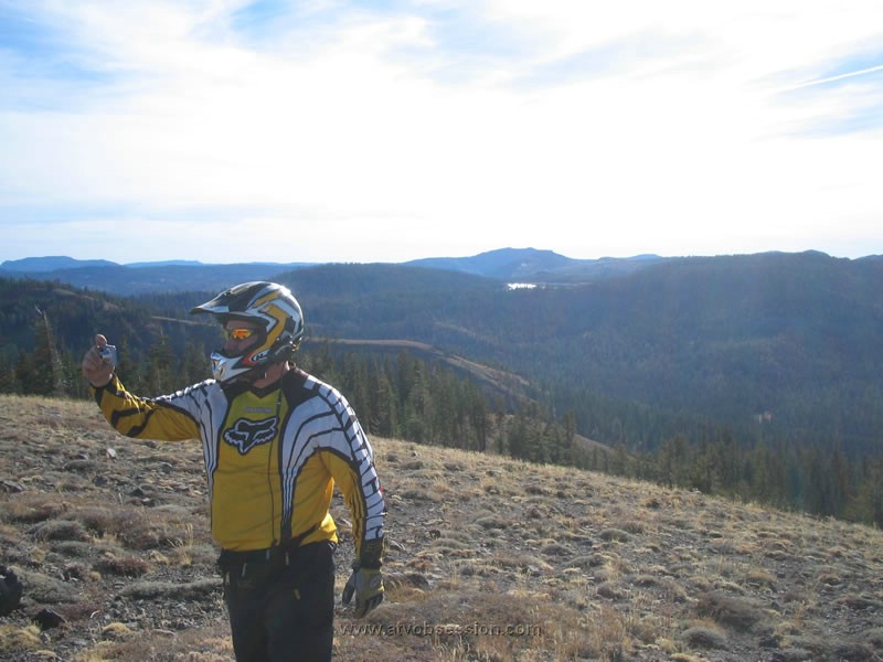 089. Joe snaps his photos...with Meadow Lake in the background..jpg