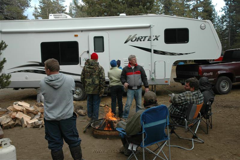 122. More mingling and a pile of wood..jpg