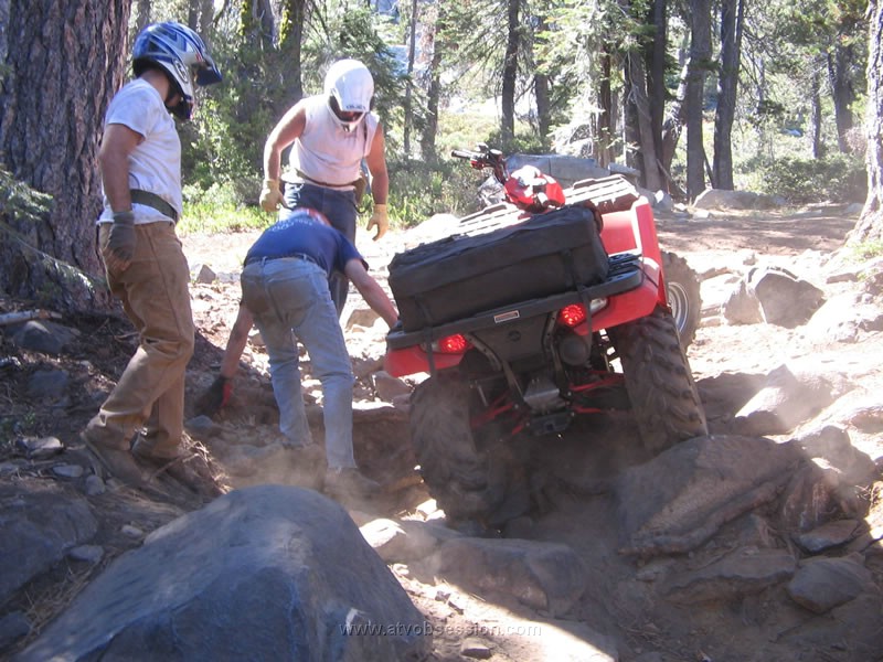 098. Dusty, Tom Z and Chad check out Tom's quad..jpg
