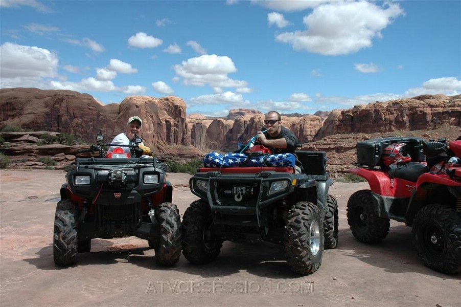 102. Dusty sucks down from his camelback..jpg