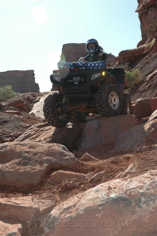 214. Dusty weaves down a rock section..jpg