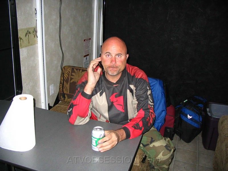 262. Back at the River Oasis...Ken phones home to end a great day..jpg