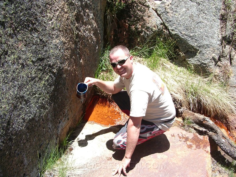 173. Ryan has a sip from the natural spring there...Mmmmm...metal..jpg
