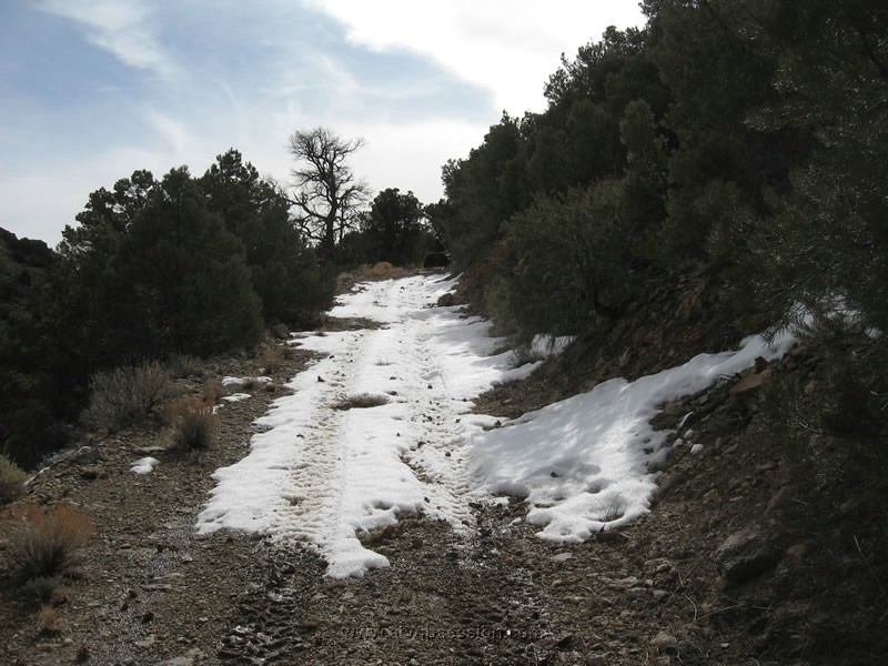 073. We start to hit some residual snow heading up to another mine..jpg