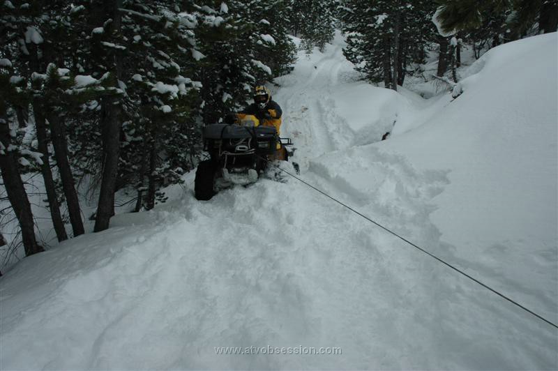 101. The right wheel..went down in the snow as the winch struggled..jpg